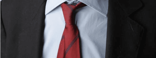 person wearing suite and tie looking professional