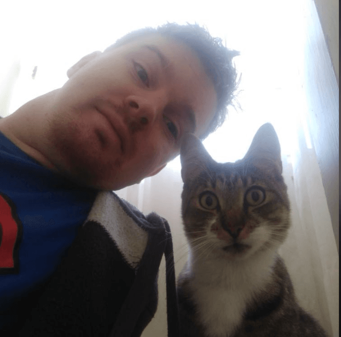 James Franklin with his cat Bandit