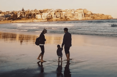 young family on beach